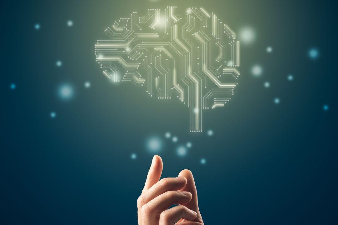 hand reaching out to ai brain