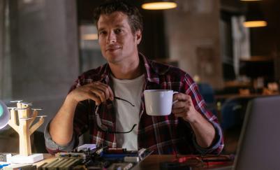 man working with electronics circuits