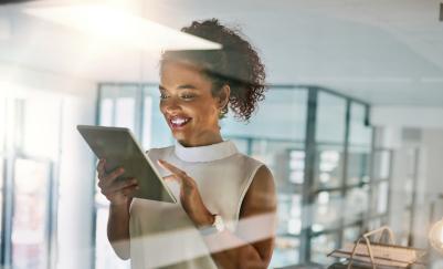 women holding ipad